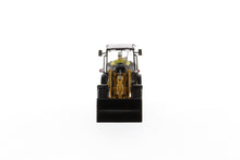 CAT 906M side view