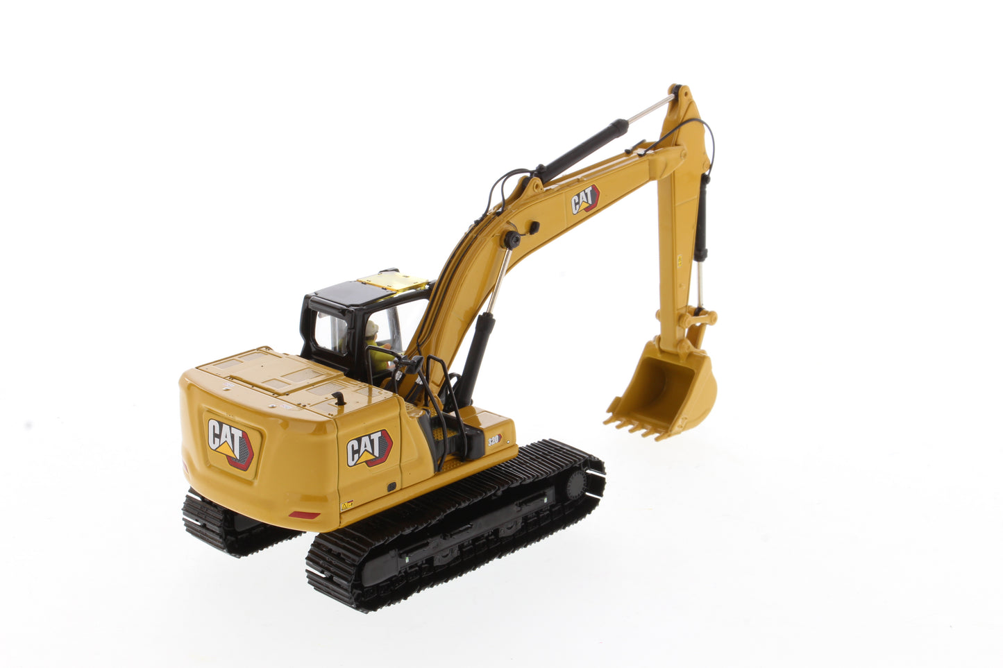 CAT 320 Next Gen excavator boom raised