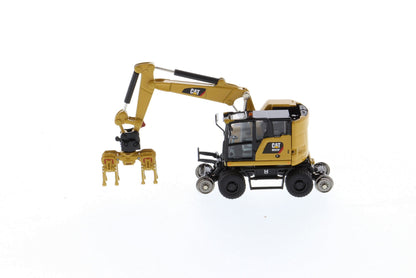 CAT M323F HO with ballast tamper attachment