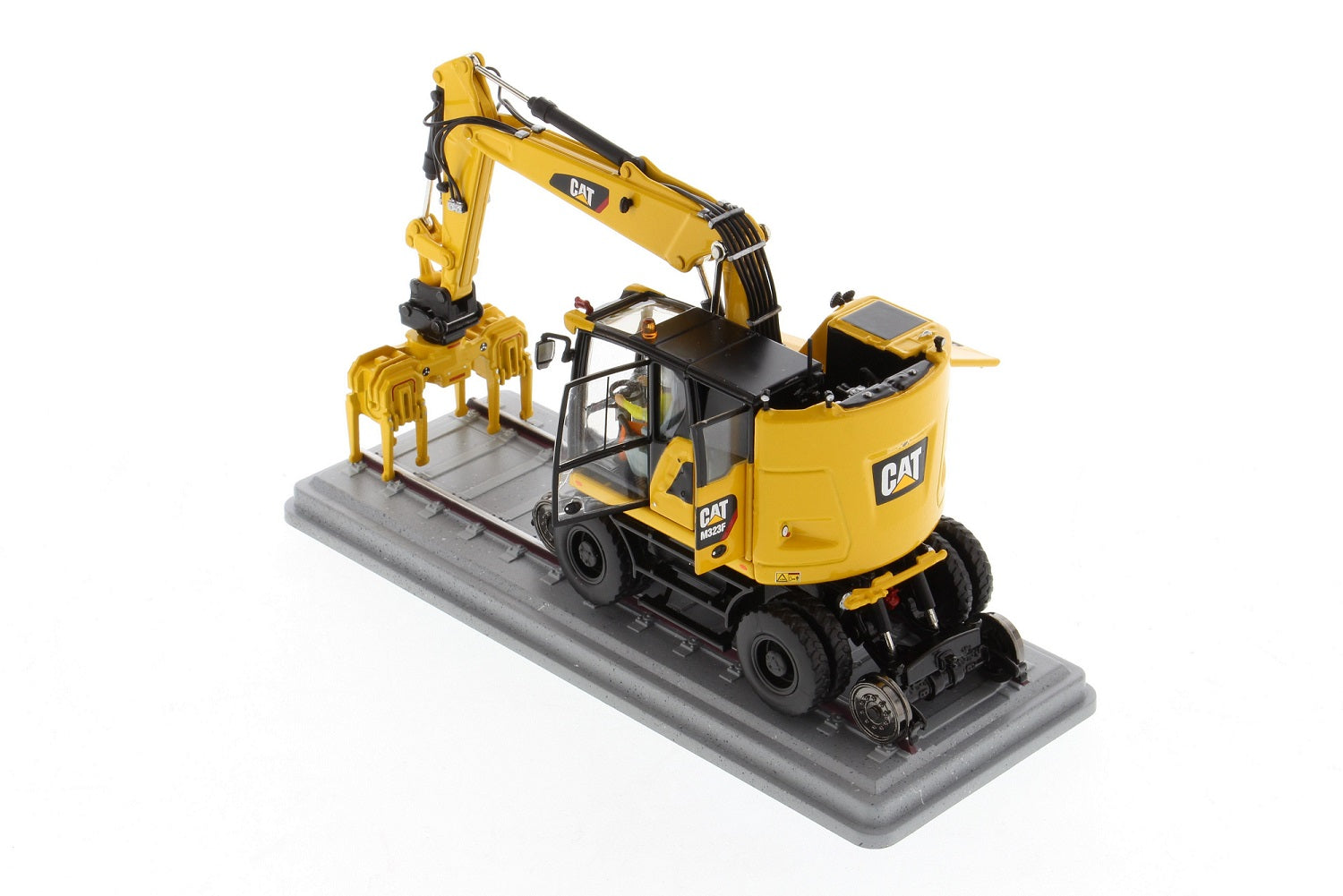 CAT M323F Safety Yellow rail wheel detail