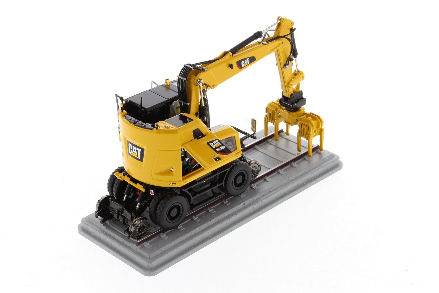 CAT M323F Safety Yellow front view