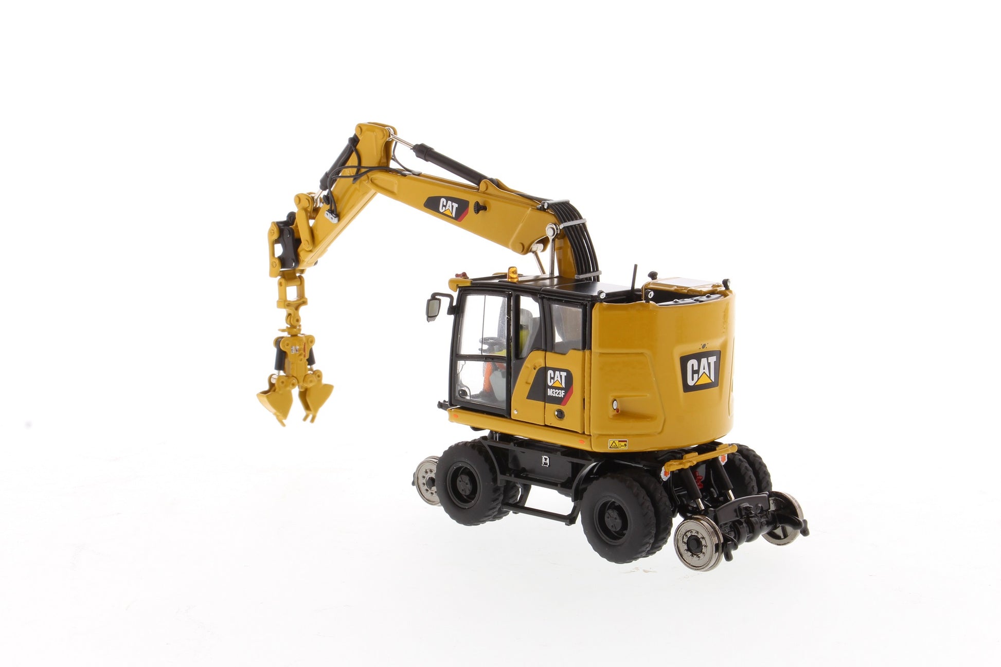CAT M323F Railroad Excavator rail wheel detail
