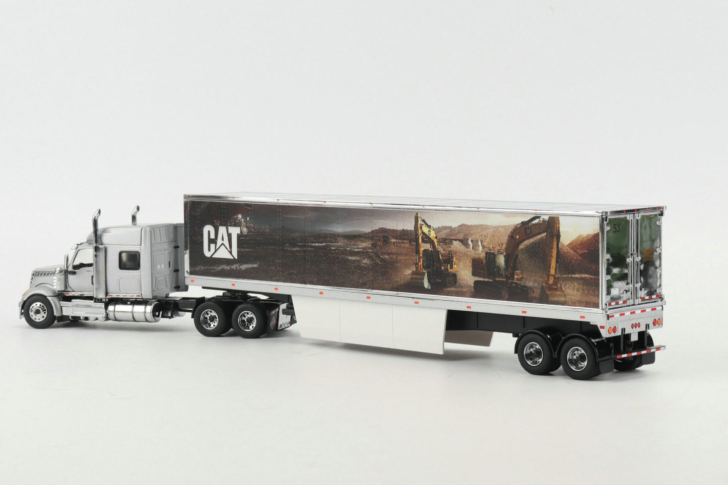 International Lonestar Sleeper Truck with CAT Mural Trailer Core Classic Series 1:50 Scale Die Cast Model
