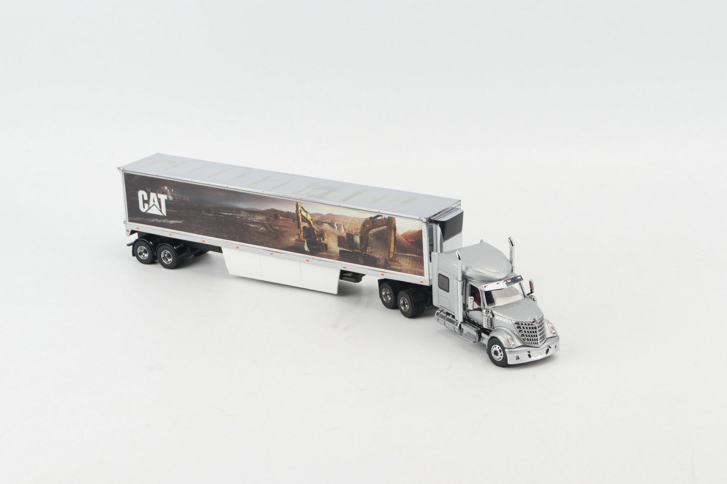 International Lonestar Sleeper Truck with CAT Mural Trailer Core Classic Series 1:50 Scale Die Cast Model