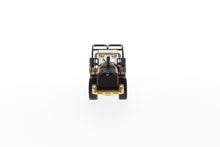 CAT 972M Log Forks side view