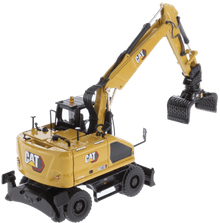 CAT M318 Wheeled Excavator with grapple attachment