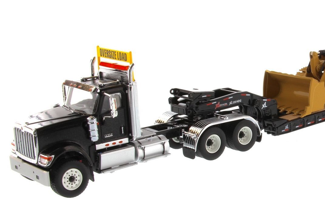 International HX520 Tandem Black with XL120 Trailer and CAT 963K Track Loader 1:50 Scale Die Cast Model